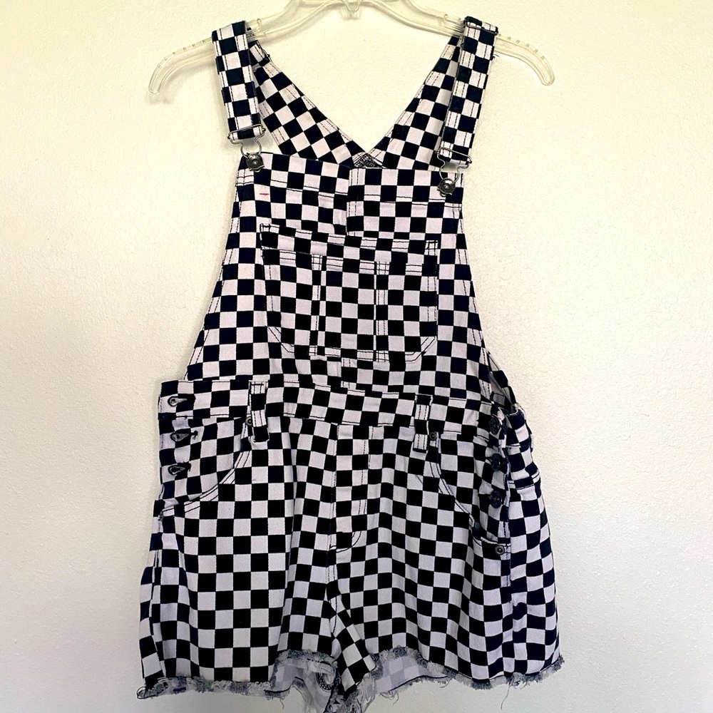 Checkerboard overalls.